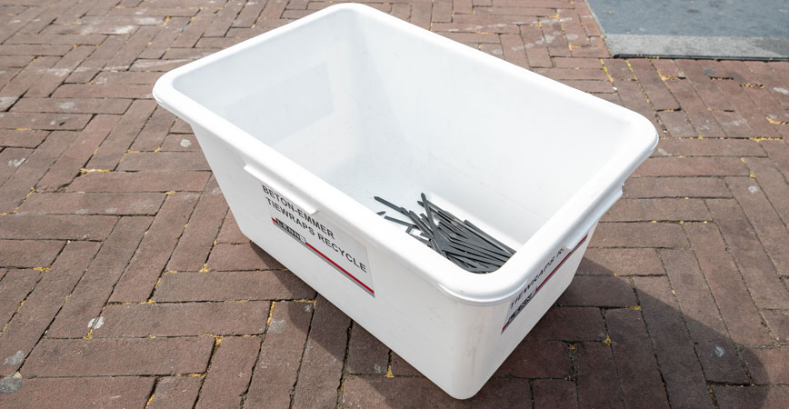 A white container with a sticker 